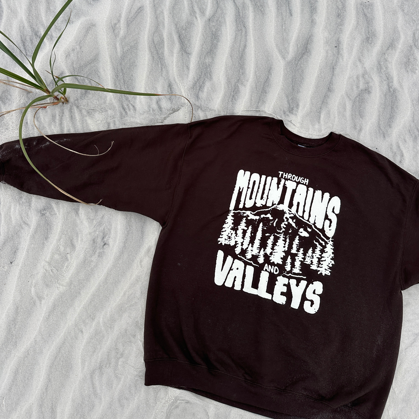 through mountains and valleys crewneck